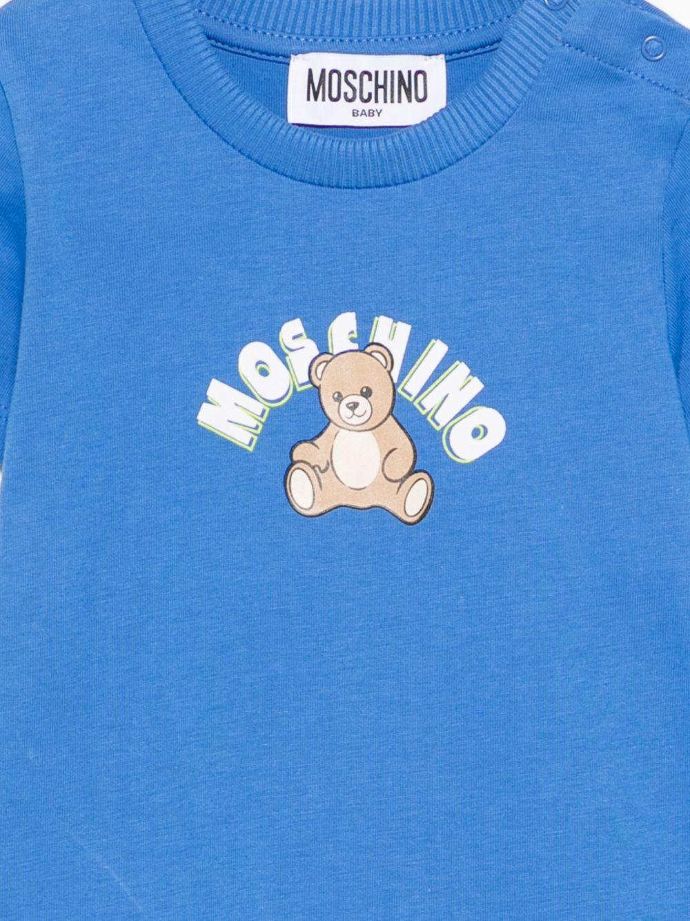 Tutina per neonati Moschino Kids azzurra con Teddy Bear sul davanti MTY022LAA01 40630 MOSCHINO KIDS 