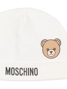 Berretto per neonati Moschino Kids bianco con motivo orsetto MUX05ULCA19 10063 MOSCHINO KIDS 
