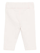 Pantaloni per neonata Donsje bianchi con motivo unicorno 3040705 00001 DONSJE 