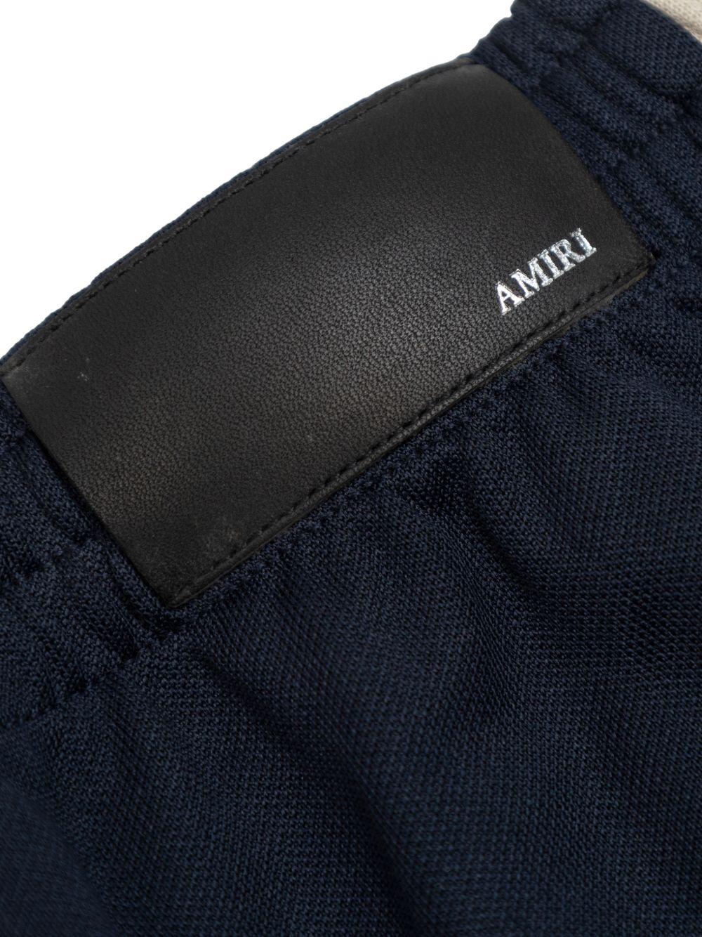 Pantaloni sportivi per bambino Amiri Kids blu con dettaglio logo ACBMPA1001 508 AMIRI KIDS 