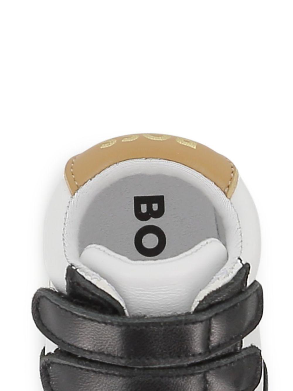 Scarpine primi passi per neonato Boss Kids bianche e nere con design a inserti J53243 09B BOSS KIDS 