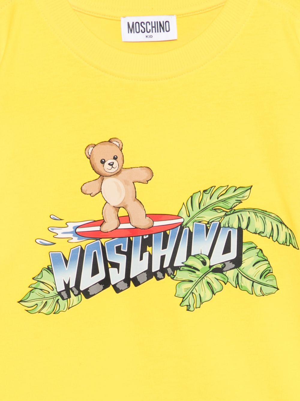 T-shirt per bambino Moschino Kids gialla con stampa logo sul davanti HUM05KLAA23 50577 MOSCHINO KIDS 