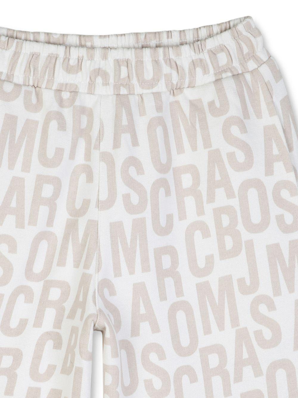 Shorts per bambino The Marc Jacobs Kids con stampa beige chiaro logo all-over W60783 126 THE MARC JACOBS KIDS 