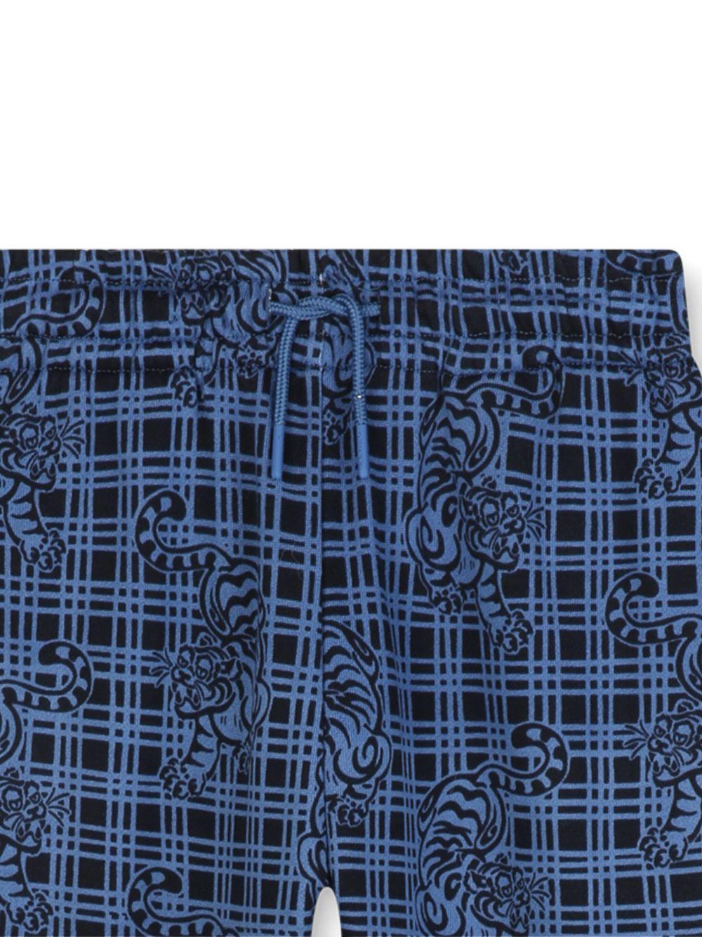 Pantaloni sportivi per bambino Kenzo Kids blu a quadri con stampa Tiger K61406 780 KENZO KIDS 