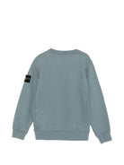 Felpa per bambino Stone Island Kids azzurra con distintivo Compass L2S166100001S0A20 V004B STONE ISLAND KIDS 