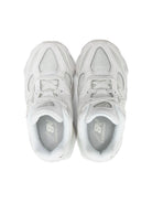 Sneakers per bambini New Balance Kids bianche con placca con logo PC9060 LL NEW BALANCE KIDS 
