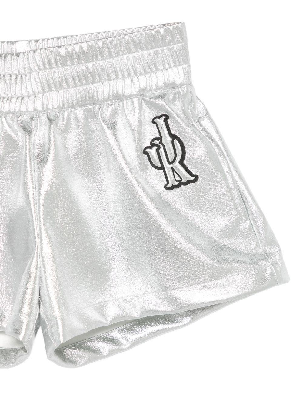 Shorts per bambino John Richmond Junior argento metalizzato con dettaglio logo RGP26044SH SILVER JOHN RICHMOND JUNIOR 