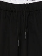 Shorts per bambino John Richmond Junior neri con tappa con logo sul retro RBP26242BE BLACK JOHN RICHMOND KIDS 