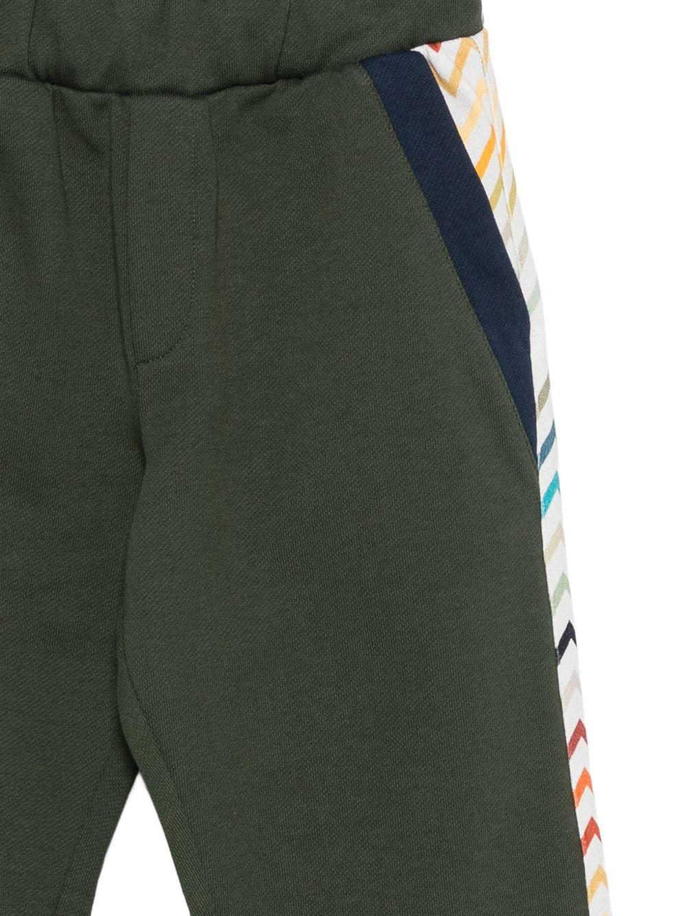 Pantaloni per bambino Missoni Kids verde con bande laterali a zigzag MZ6H10 Z3183 70J MISSONI KIDS 