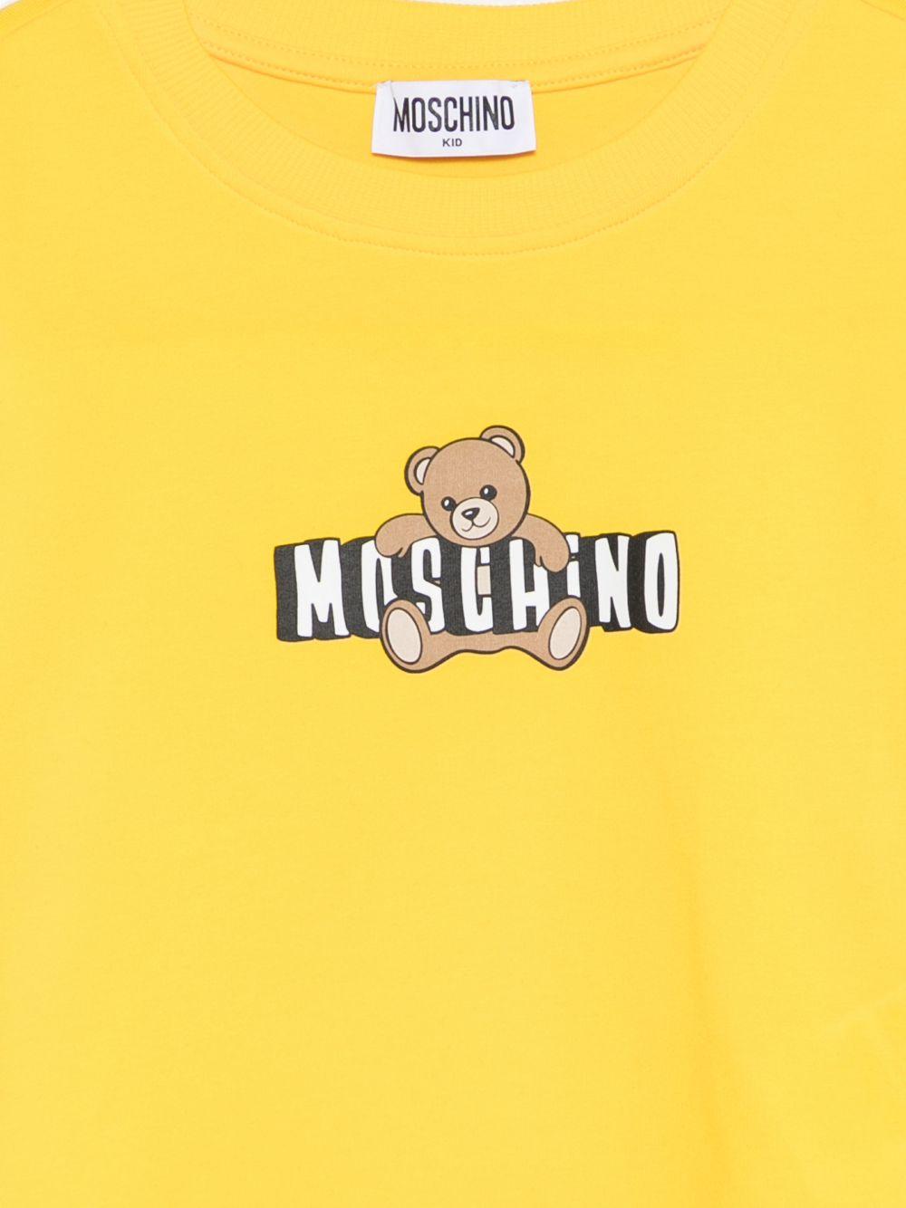T-shirt per bambina Moschino Kids gialla con stampa Teddy sul davanti HDM072LBA00 50577 MOSCHINO KIDS 