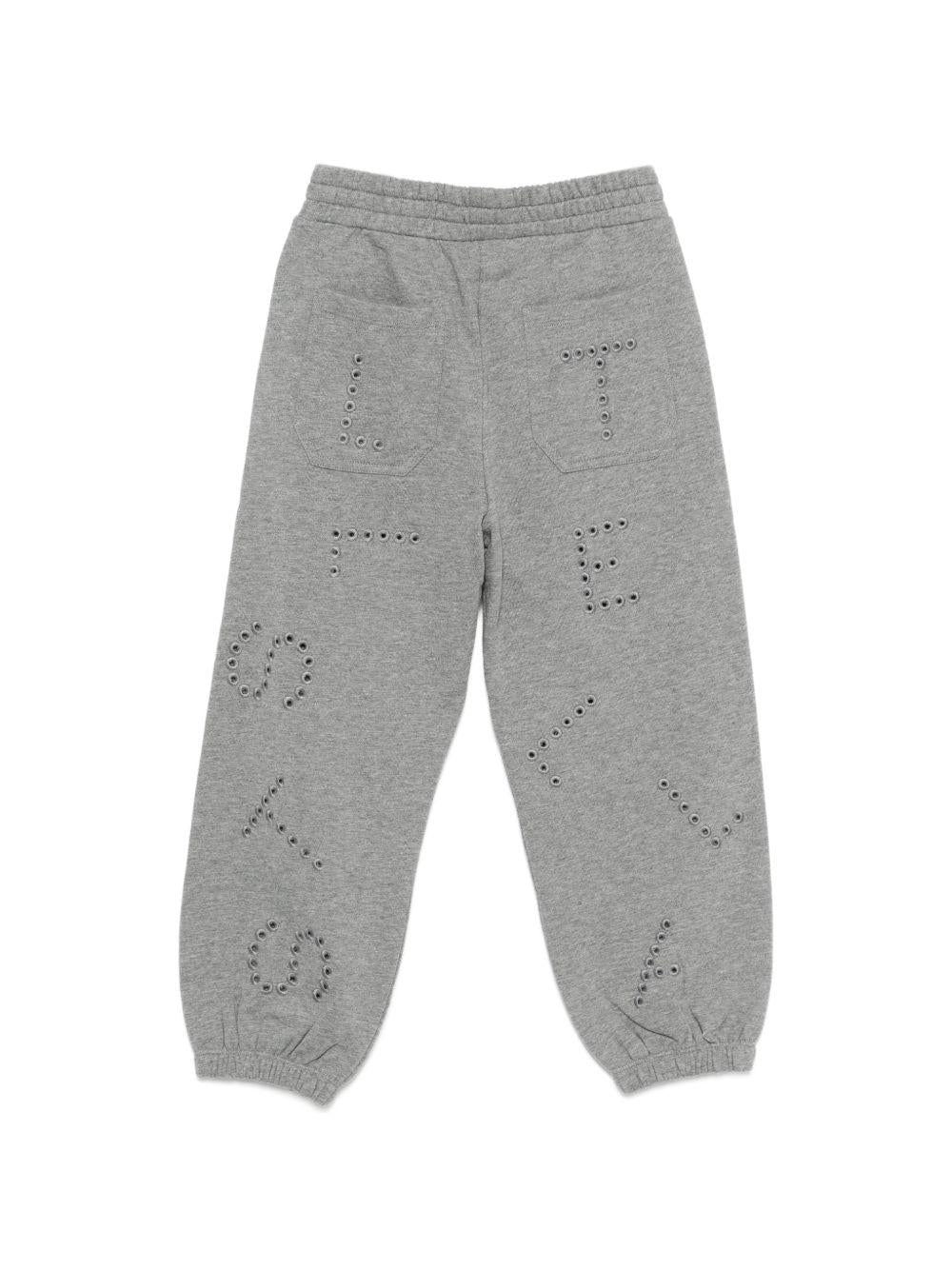 Pantaloni sportivi per bambina Stella McCartney Kids grigi con logo sul davanti TY6D40 Z3409 808 STELLA McCARTNEY KIDS 