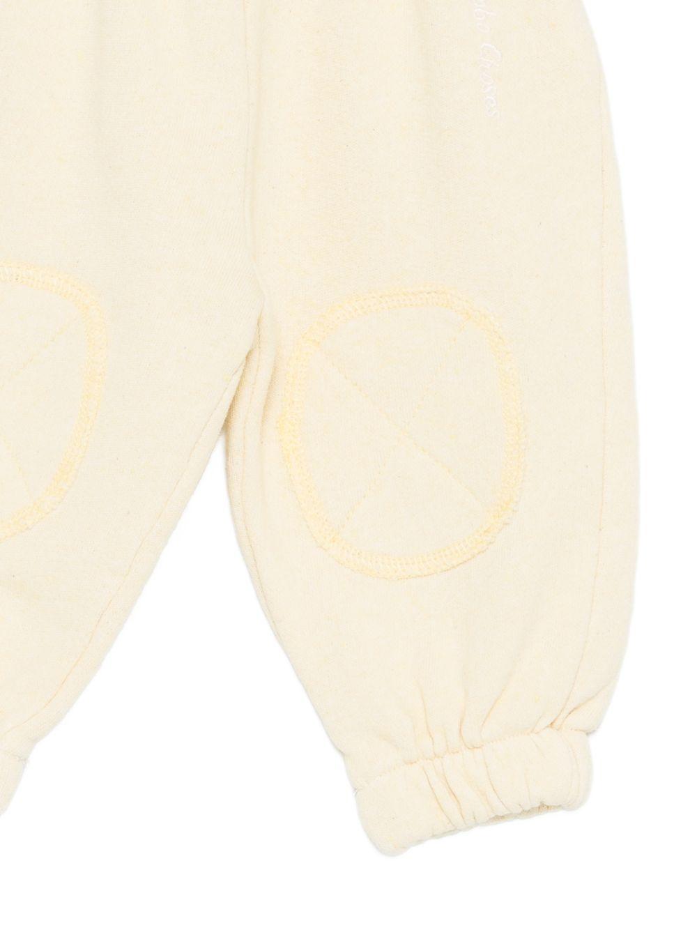 Shorts per neonato Bobo Choses beige con toppe gialle B126AB067 721 BOBO CHOSES KIDS 
