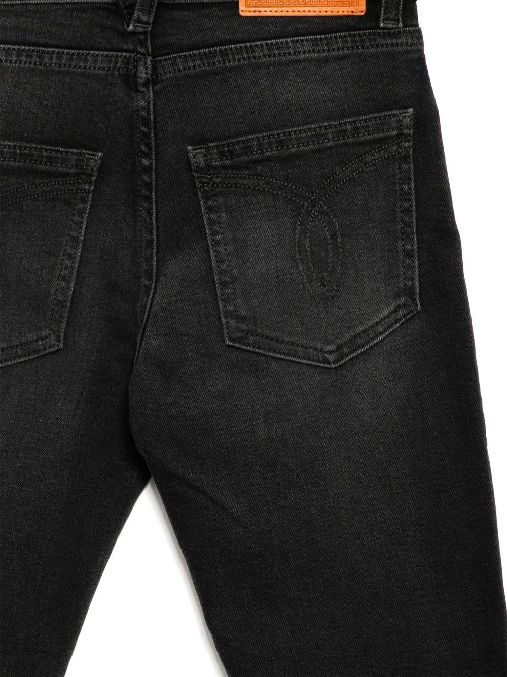 Jeans per bambina Versace Kids in denim nero modello dritto 10184651A13136 1D040 VERSACE KIDS 