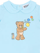 Tutina per neonati Moschino Kids azzurra con stampa grafica Orsetto con bolle di sapone MUT04MLAA03 40304 MOSCHINO KIDS 