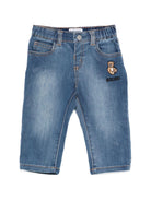 Jeans per neonato Moschino Kids in denim con applicazione Teddy Bear MNP04ZLXE43 40332 MOSCHINO KIDS 