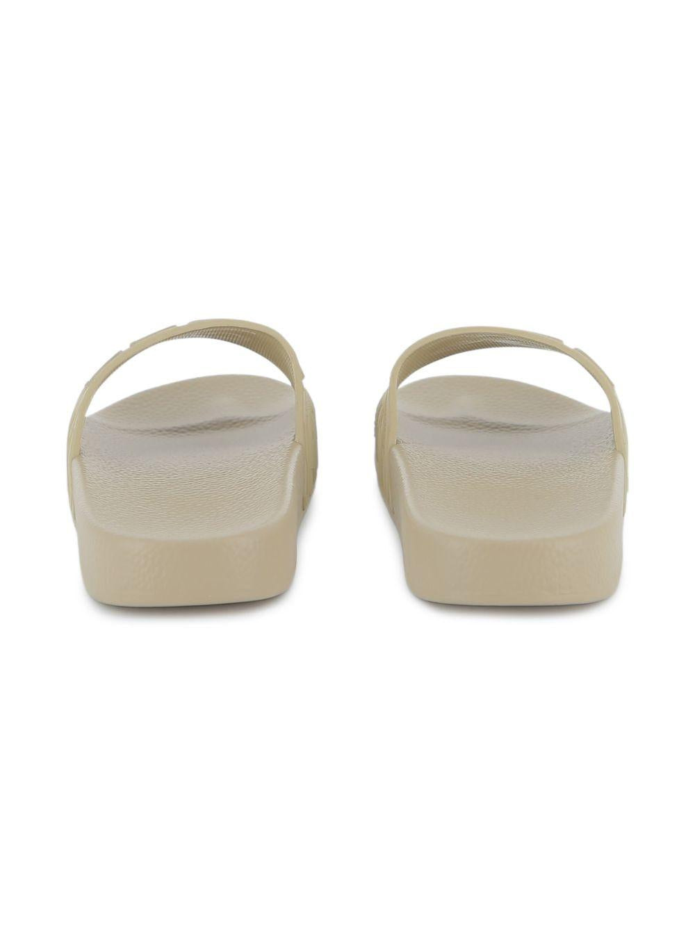 Ciabatte per bambino Boss Kids beige con dettaglio con logo J52799 249 BOSS KIDS 