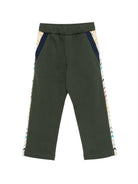 Pantaloni per bambino Missoni Kids verde con bande laterali a zigzag MZ6H10 Z3183 70J MISSONI KIDS 