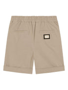 Shorts per bambino Dolce & Gabbana Kids beige con logo posteriore L43Q88 FUFL3 M0208 DOLCE & GABBANA KIDS 