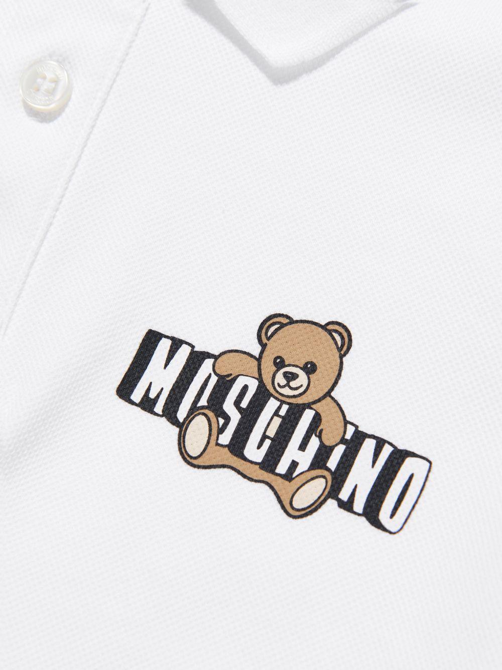 Polo da bambino Moschino Kids bianca con stampa orsacchiotto HSM03YLFA09 10101 MOSCHINO KIDS 