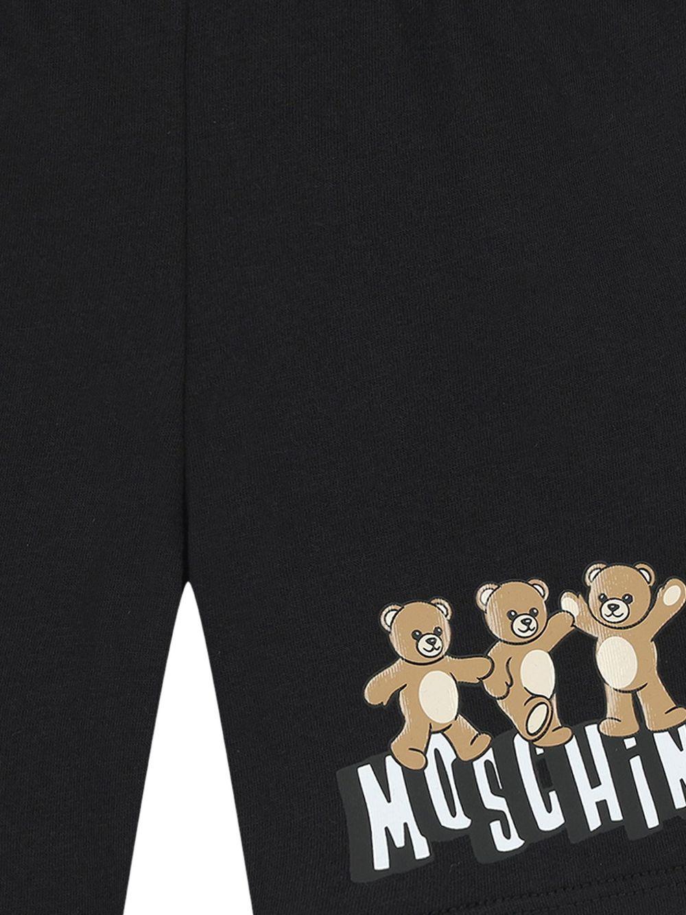 Pantaloncini per neonato Moschino Kids neri con stampa tre Teddy Bear MUQ01ULAA17 60100 MOSCHINO KIDS 