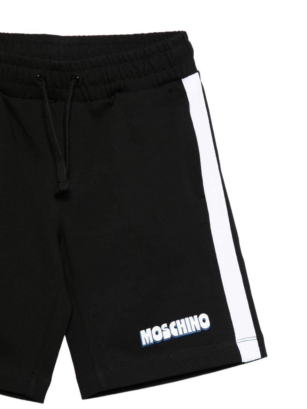 Completo per bambino Moschino Kids nero con dettagli a contrasto HUG00XLAA51 60100 MOSCHINO KIDS 