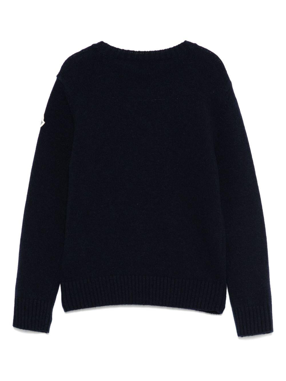 Maglione per bambina Moncler Enfant blu notte in lana vergine con toppa con logo K29549C00001M1241 745 MONCLER ENFANT 