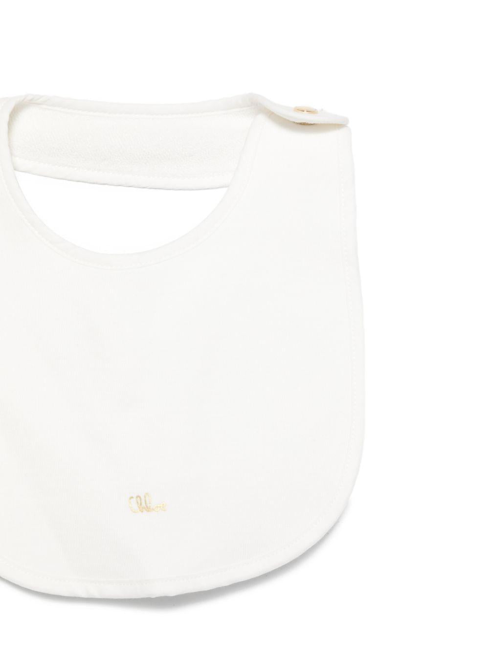 Set tutina, bavaglino e cappellino per neonata Chloé Kids bianco con colletto arricciato C20926 117 CHLOE' KIDS 