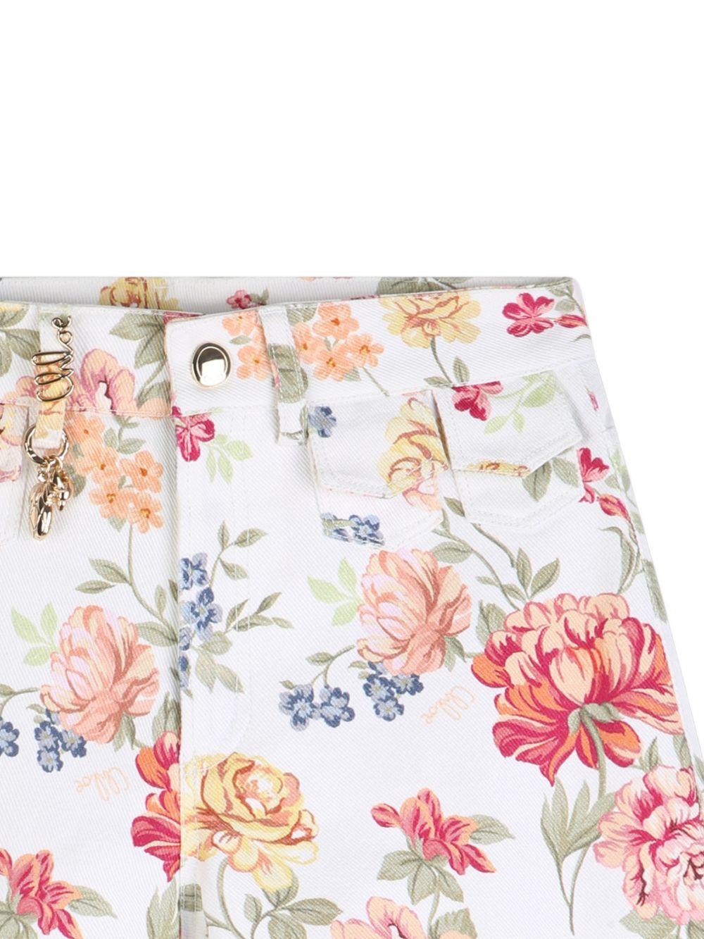 Shorts per bambina Chloé Kids bianchi con ciondolo a fiori C20849 S95 CHLOE' KIDS 