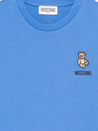 T-shirt per bambini Moschino Kids azzurro con applicazione Teddy Bear HUM05TLAA02 40630 MOSCHINO KIDS 