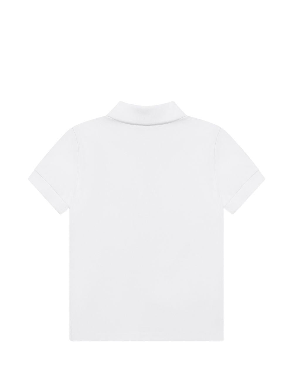 Polo da bambino Moschino Kids bianca con stampa orsacchiotto HSM03YLFA09 10101 MOSCHINO KIDS 