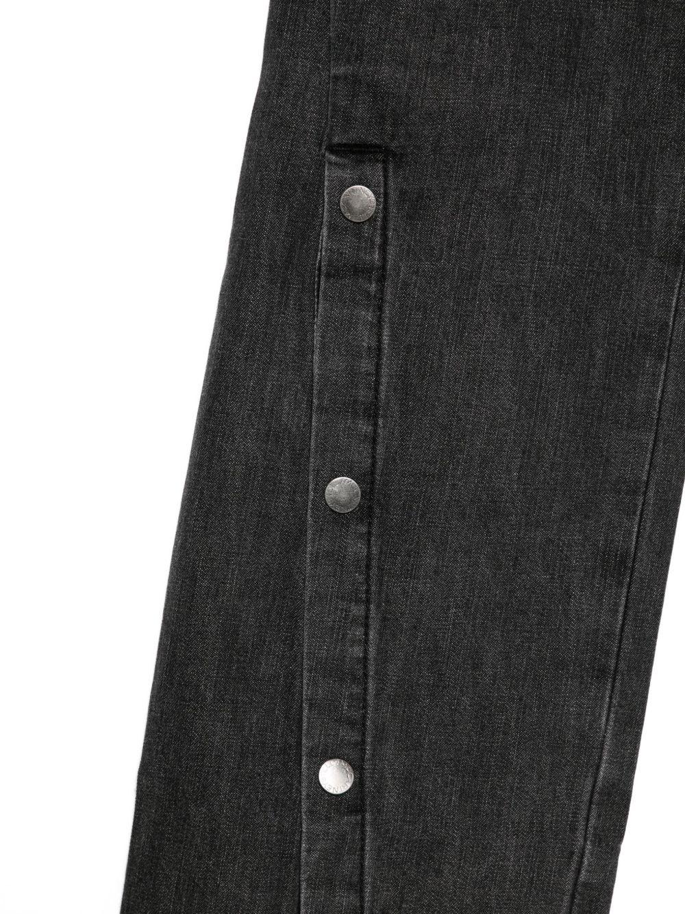 Jeans per bambina Stella McCartney Kids in denim nero con bottoni sulla gamba TX6D40 Z0746 961 STELLA McCARTNEY KIDS 