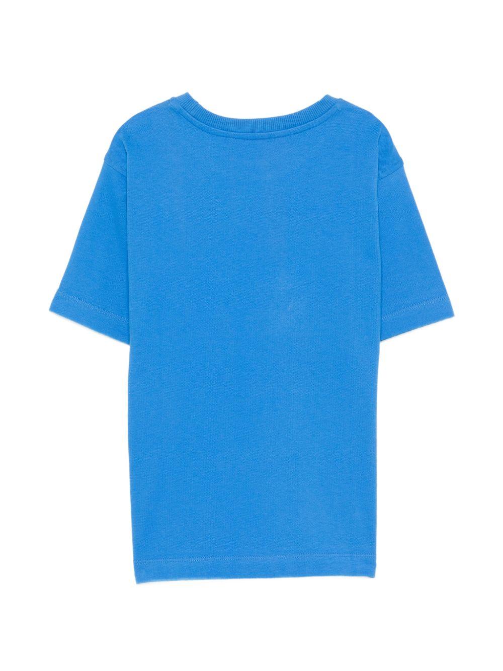 T-shirt per bambini Moschino Kids azzurra con stampa Teddy Bear sul davanti HYM03SLFA07 40630 MOSCHINO KIDS 