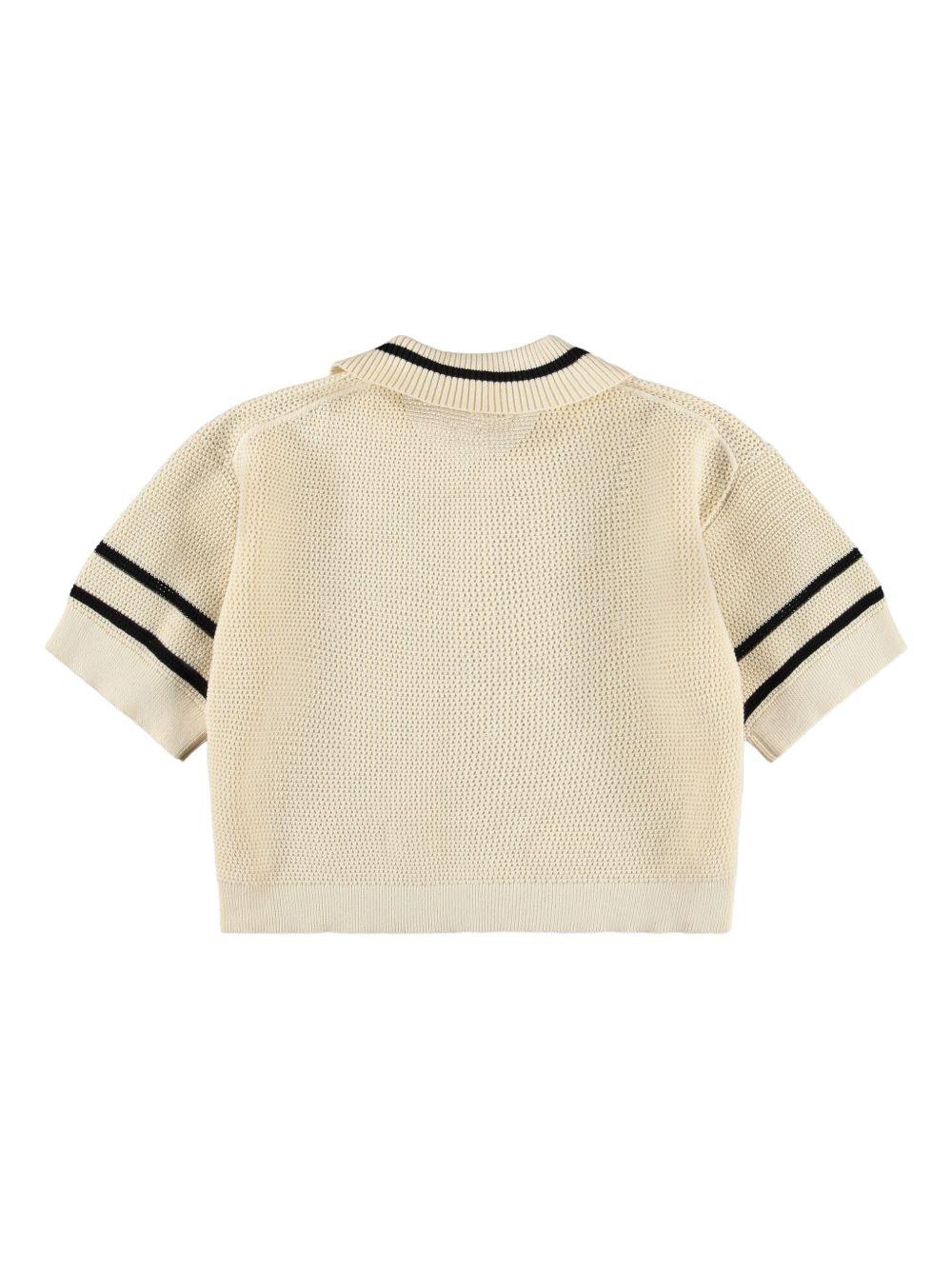 Polo Gwinn per bambina Molo beige con decorazione a righe 2S26K205 8894 MOLO KIDS 
