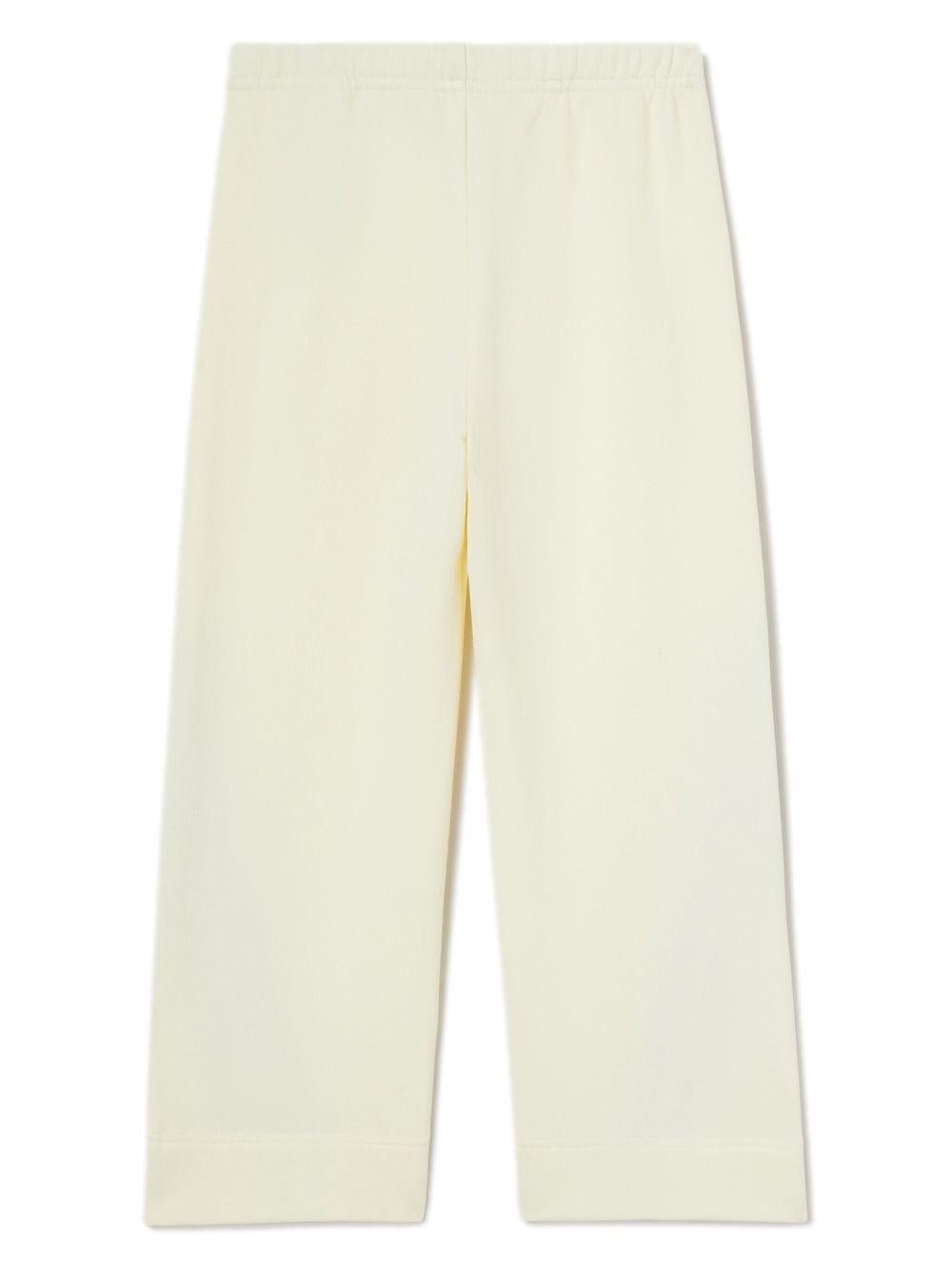 Pantaloni sportivi ampi per bambina Palm Angels Kids bianco con stampa PGCH00AS25FLE001 043B PALM ANGELS KIDS 