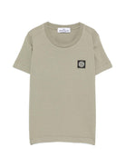 T-shirt per bambino Stone Island Kids verde con applicazione logo sul davanti L2S162100003S0047 V0068 STONE ISLAND KIDS 