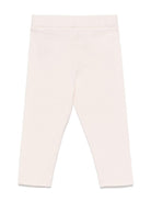 Leggings per neonata Moncler Enfant rosa con applicazione logo sulla gamba K19518H0000289AUM 529 MONCLER KIDS 
