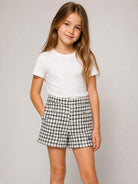 Shorts per bambina Balmain Kids bianco e neri con motivo a quadri BZ6B51 E0253 102AG BALMAIN KIDS 