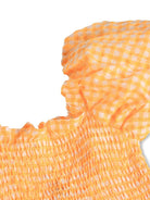 Abito Cherisla per bambina Molo arancione con corsetto con punto smock 2S26E138 9490 MOLO KIDS 