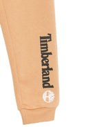 Pantaloni sportivi per bambino Timberland Kids beige con logo sulla gamba T60974 230 TIMBERLAND KIDS 