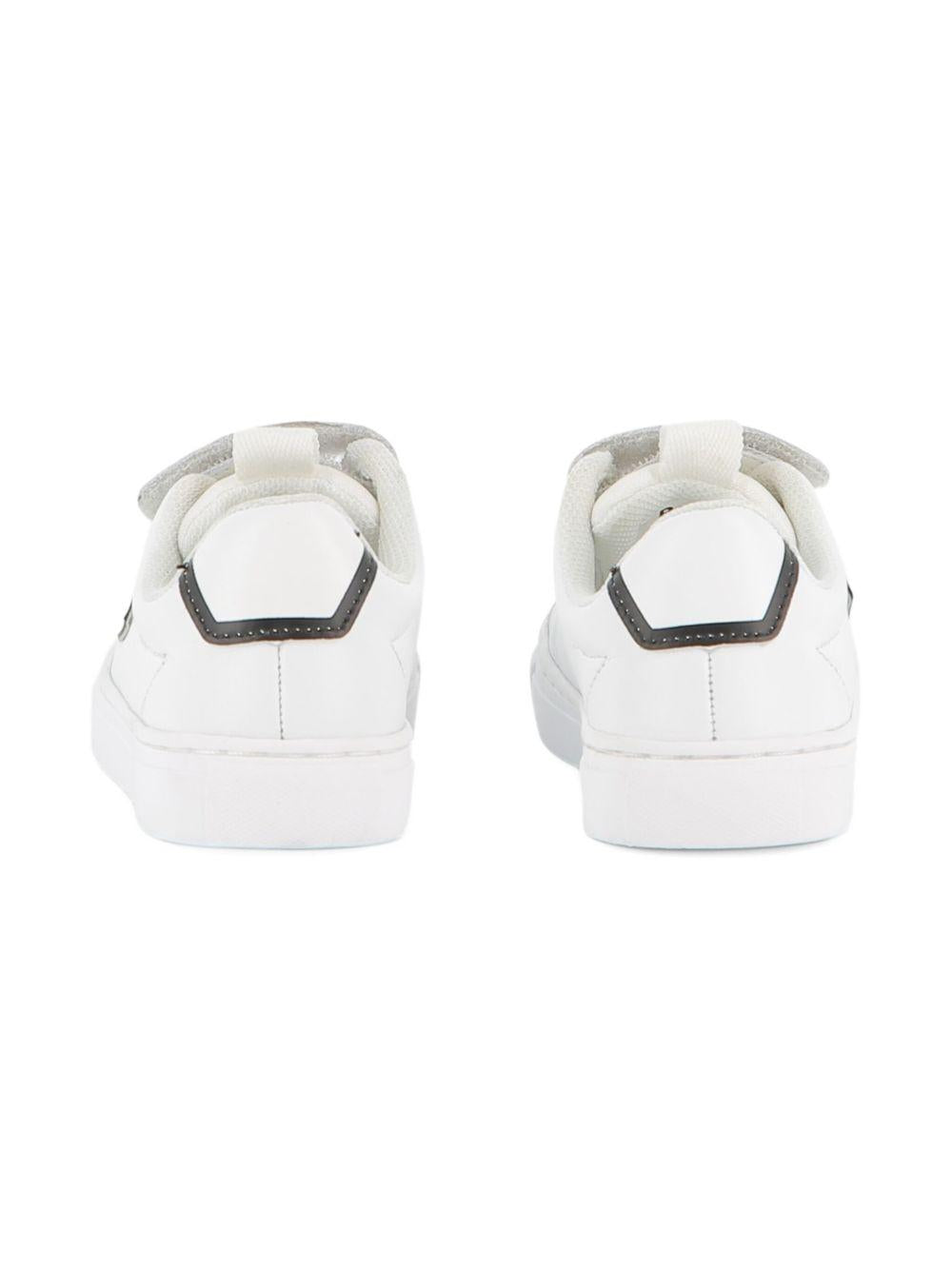 Sneakers per bambino BOSS Kids bianche con applicazione con logo J52573 10P BOSS KIDS 