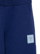 Pantaloni per bambino Emporio Armani Kids blu con logo sul davanti EB001021 AF10126 UB105 EMPORIO ARMANI KIDS 