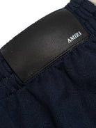 Pantaloni sportivi per bambino Amiri Kids blu con dettaglio logo ACBMPA1001 508 AMIRI KIDS 