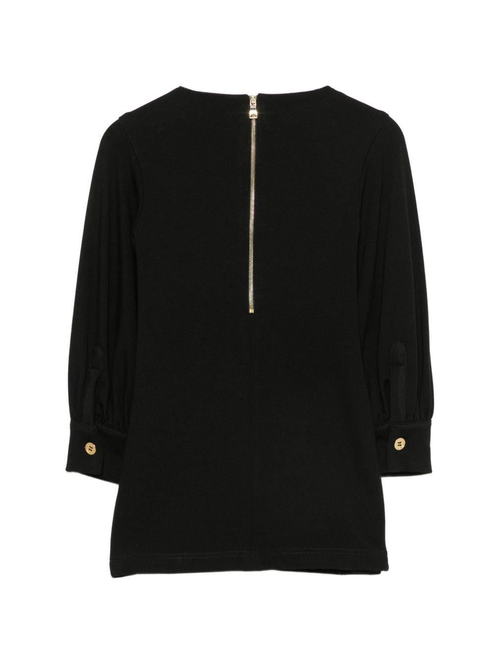 Abito per bambina Balmain Kids nero con placca con logo sul davanti BZ1B00 J0371 930OR BALMAIN KIDS 