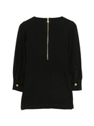 Abito per bambina Balmain Kids nero con placca con logo sul davanti BZ1B00 J0371 930OR BALMAIN KIDS 