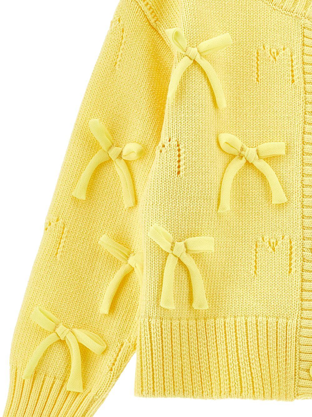 Cardigan per bambina Monnalisa giallo con dettagli fiocchi 17G801 7029 0014 MONNALISA KIDS 