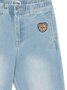Jeans per bambino Moschino Kids azzurri con decorazioni in rilievo HUP08XL0E37 41100 MOSCHINO KIDS 
