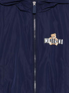 Giubbino per bambini Moschino Kids blu con stampa Teddy Bear sul davanti HUS05KL3A39 40016 MOSCHINO KIDS 