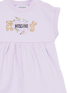 Abito per neonata Moschino Kids viola con stampa Teddy Bear MDV0DFLCA86 51683 MOSCHINO KIDS 