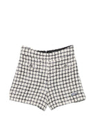 Shorts per bambina Balmain Kids bianco e neri con motivo a quadri BZ6B51 E0253 102AG BALMAIN KIDS 