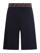 Pantaloni per bambino Fendi Kids blu con dettaglio logo sul retro JMF566 AS5Y F0QG0 FENDI KIDS 